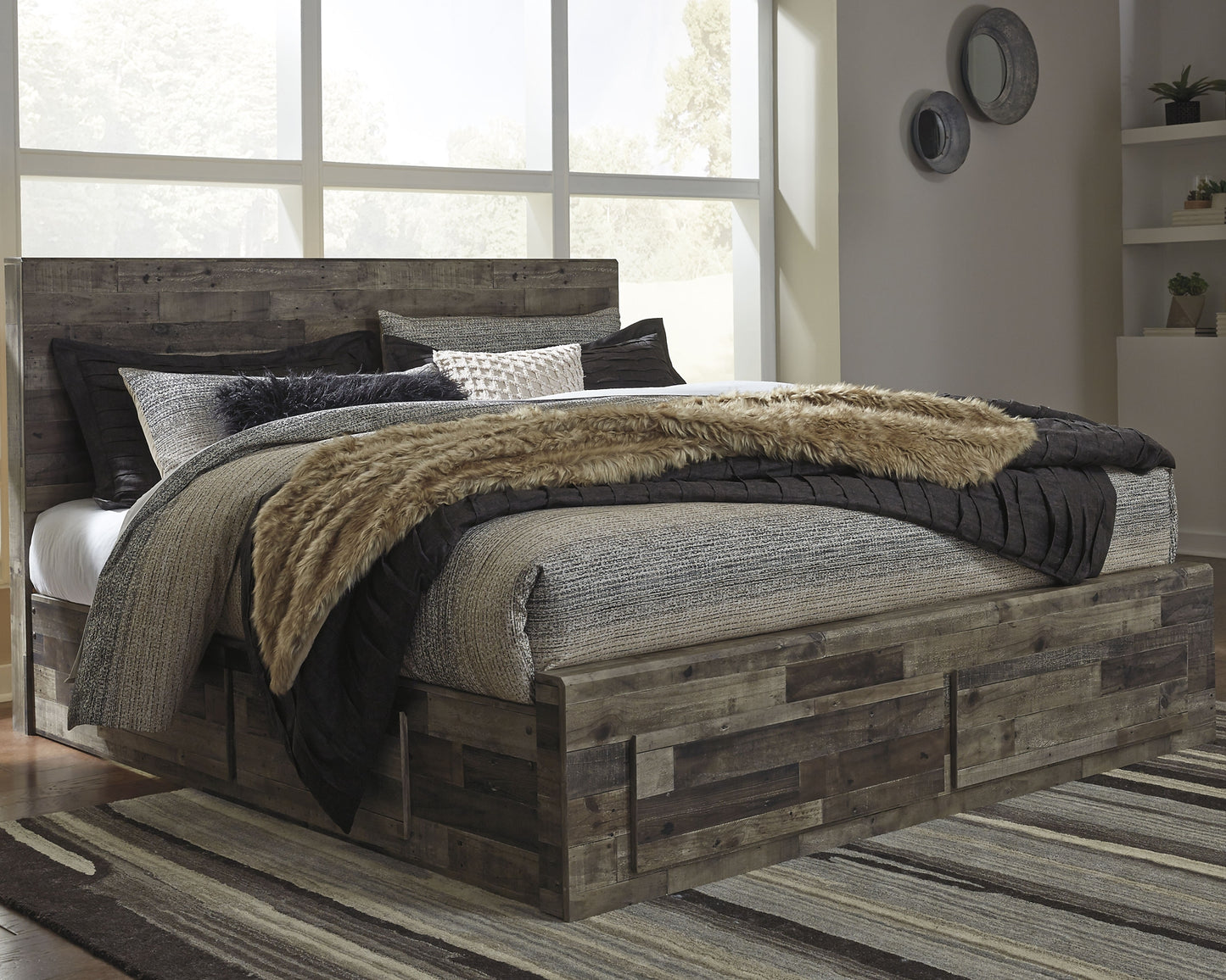 Derekson King Panel Bed with 6 Storage Drawers with Mirrored Dresser - Premier Furniture & Mattress
