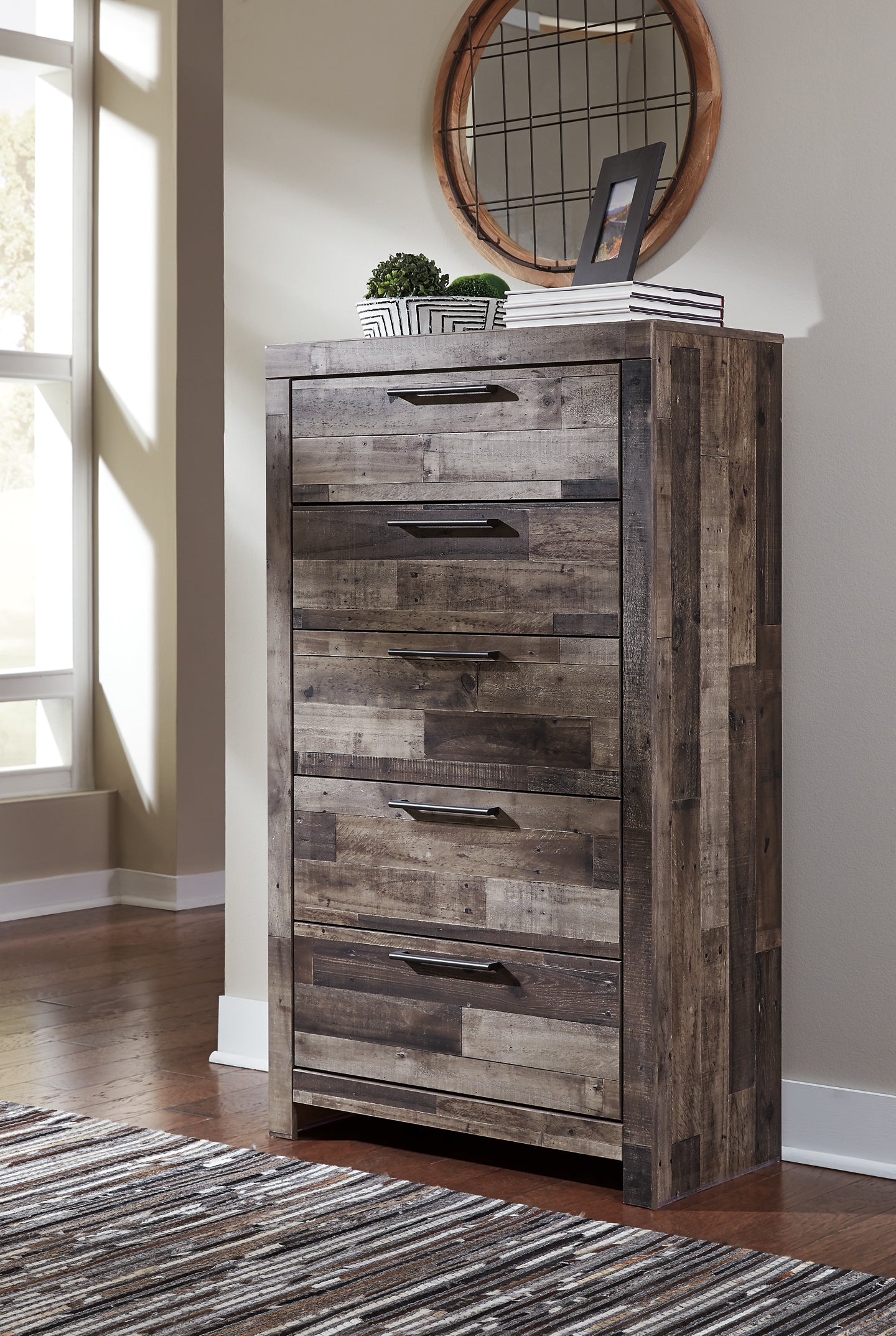 Derekson Queen Panel Bed with 6 Storage Drawers with Mirrored Dresser and Chest - Premier Furniture & Mattress