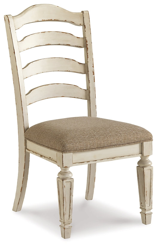 Realyn Dining Table and 8 Chairs - Premier Furniture & Mattress