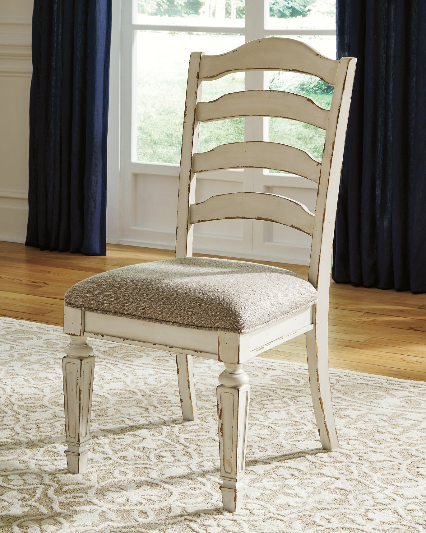 Realyn Dining Table and 8 Chairs - Premier Furniture & Mattress