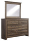 Juararo California King Poster Bed with Mirrored Dresser and 2 Nightstands - Premier Furniture & Mattress