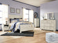 Bellaby Crossbuck Panel Bed With Mirrored Dresser, Chest And Nightstand - Premier Furniture & Mattress