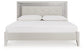 Zyniden King Upholstered Panel Bed with Mirrored Dresser, Chest and Nightstand