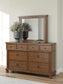Rowlenstown Queen Poster Bed with Mirrored Dresser and Nightstand