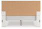 Zuraleus King Upholstered Panel Platform Bed, Dresser, Mirror and Nightstand