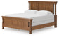 Rowlenstown King Poster Bed with Mirrored Dresser