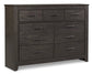 Brinxton King Panel Bed with Mirrored Dresser - Premier Furniture & Mattress