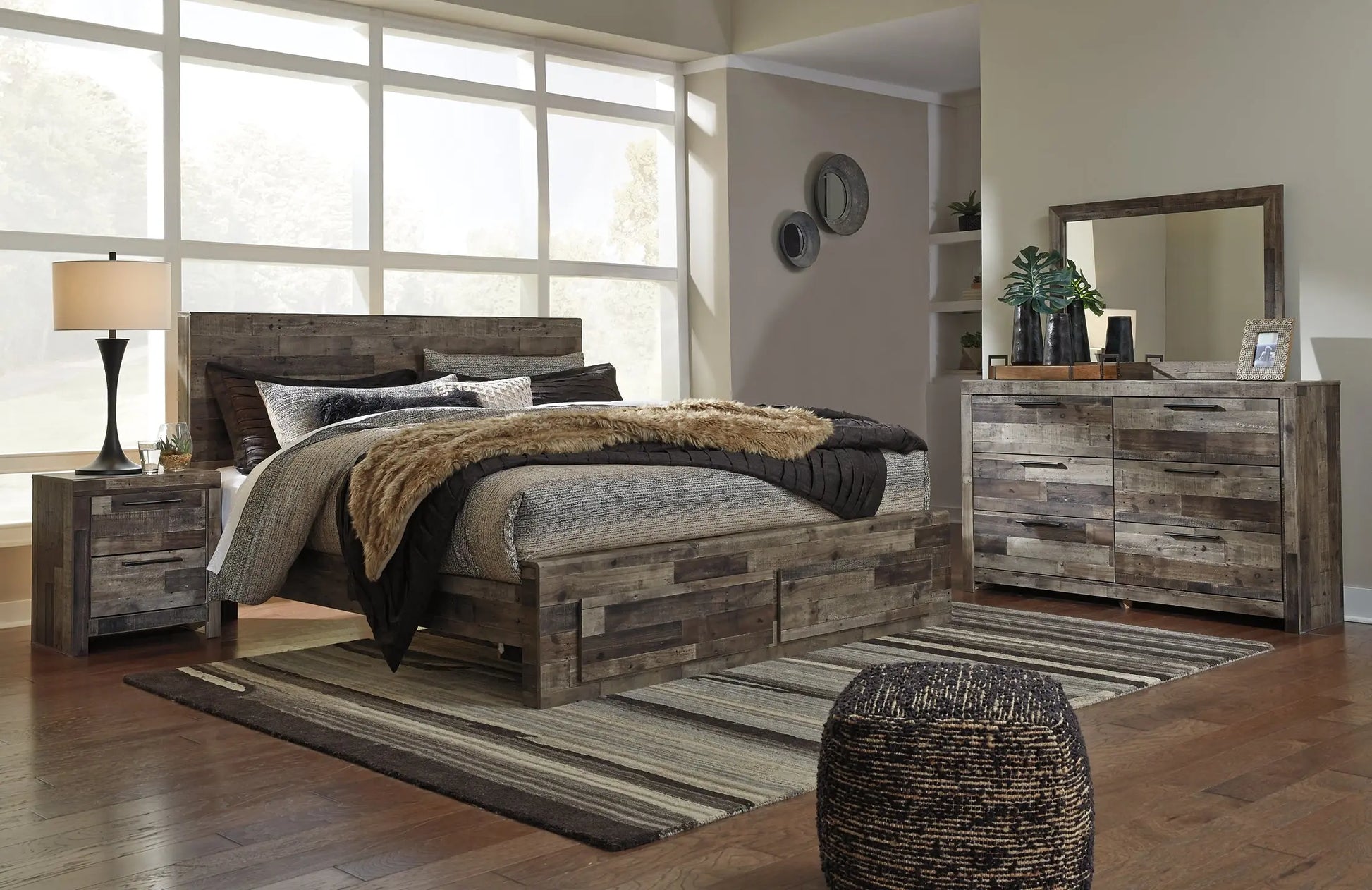 Derekson King Panel Bed with 2 Storage Drawers with Mirrored Dresser and Nightstand - Premier Furniture & Mattress