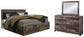 Derekson King Panel Bed with 4 Storage Drawers with Mirrored Dresser Premier Furniture & Mattress