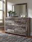 Derekson Queen Panel Bed with 6 Storage Drawers with Mirrored Dresser Premier Furniture & Mattress