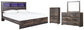 Drystan King Panel Bookcase Bed with Mirrored Dresser and Chest - Premier Furniture & Mattress
