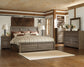 Juararo California King Panel Bed with Mirrored Dresser - Premier Furniture & Mattress