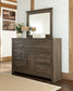 Juararo Queen Poster Bed with Mirrored Dresser Premier Furniture & Mattress