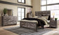 Wynnlow King Crossbuck Panel Bed with Mirrored Dresser Premier Furniture & Mattress