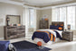 Derekson Twin Panel Headboard with Mirrored Dresser, Chest and Nightstand - Premier Furniture & Mattress