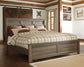 Juararo California King Panel Bed with Mirrored Dresser, Chest and Nightstand - Premier Furniture & Mattress