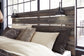 Drystan Queen Panel Bed with 4 Storage Drawers with Mirrored Dresser, Chest and Nightstand - Premier Furniture & Mattress
