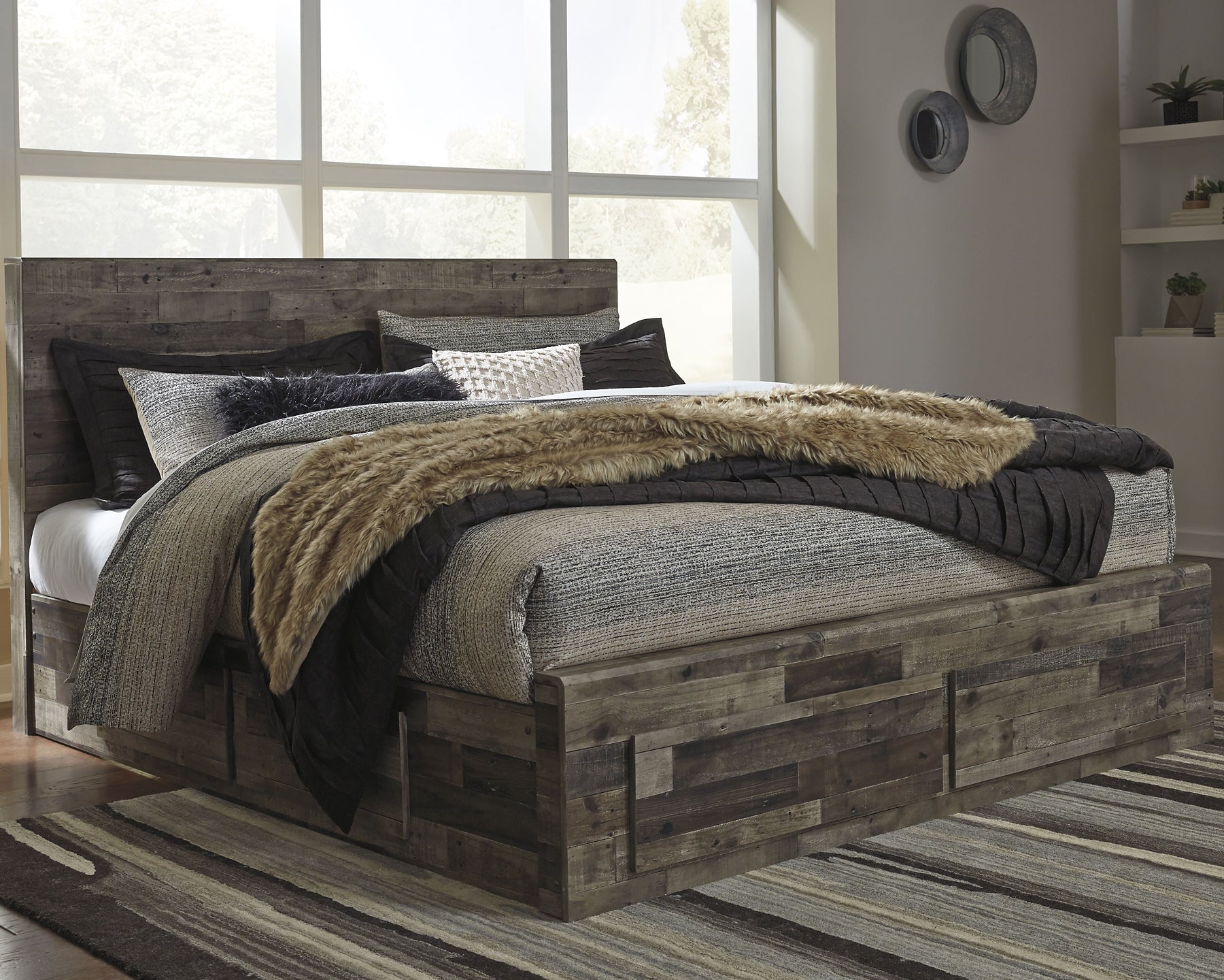 Derekson King Panel Bed with 6 Storage Drawers with Mirrored Dresser, Chest and Nightstand - Premier Furniture & Mattress