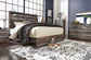 Drystan King Panel Bed with Mirrored Dresser, Chest and Nightstand - Premier Furniture & Mattress