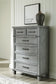 Russelyn King Storage Bed with Mirrored Dresser and Chest - Premier Furniture & Mattress