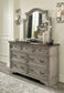Lodenbay California King Panel Bed with Mirrored Dresser and Chest - Premier Furniture & Mattress