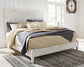 Paxberry King Panel Bed with Mirrored Dresser and Chest - Premier Furniture & Mattress